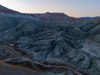 Twilight aerial view of Nallıhan's strikingly eroded hills in Turkey. The multicolored geological...