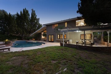 Modern luxury home interior and exterior with pool, spacious rooms, and stylish furnishings