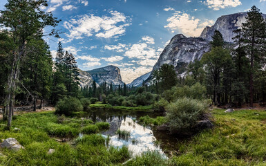 Tranquil Mountain Lake Scene with Clear Skies and Pine Trees
