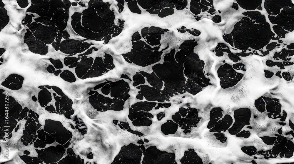 Poster high-resolution abstract image of black water surface with white foam and bubbles creating a mesmeri