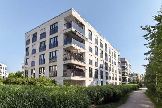 Cityscape of a residential area with modern apartment buildings, new green urban landscape in the city