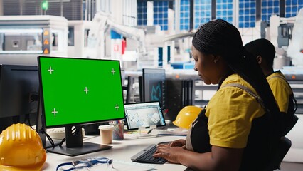 Solar panels plant engineer overseeing energy consumption using isolated screen PC. Photovoltaics...