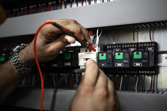 An electrical engineer performs daily tasks in the high-voltage field.