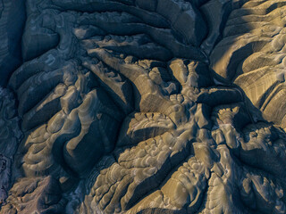 Aerial view of heavily eroded sedimentary rock layers in Nallıhan, Turkey. This dramatic geologic...