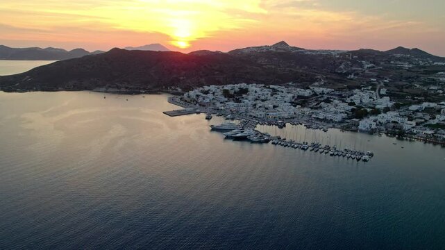 Sunset over harbor with yachts and mountains 4K