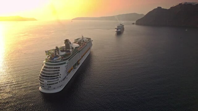 Two cruise ships at sunset in front of cliffs 4K