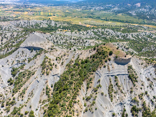 Aerial view of rocky hills and scattered vegetation in Asarlık Hills, Nallıhan, Ankara. The...