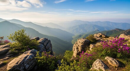 Serene Mountain Vista with Layered Peaks Misty Valleys and Blooming Rhododendrons.
