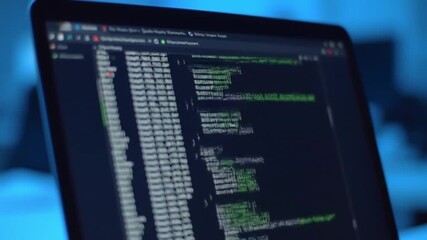 Close-up perspective of a computer screen displaying lines of programming code for software development. - Powered by Adobe