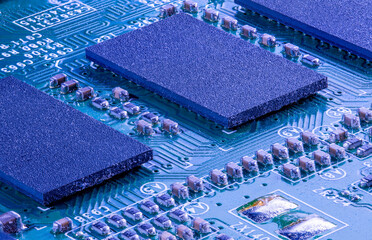 silicon microchips on a circuit board close-up
