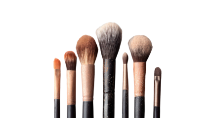 Makeup palette with brushes and lipstick tubes beauty accessories on white background