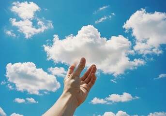 Reaching for the clouds with an open hand