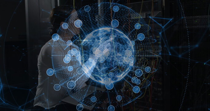 Monitoring female technician configuring racks, patch panels in data center, with holographic globe