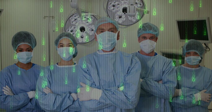 Standing surgical team wearing blue gowns and masks in operating room, with lights IV stand monitor - Powered by Adobe