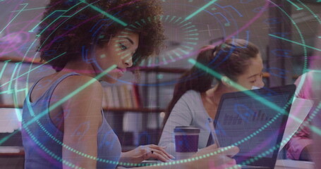 Typing woman in sleeveless top at library on laptop, with coffee cup, digital overlay, copy space