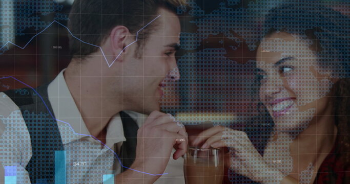 Smiling couple leaning forward and sharing tall glass with two straws at wooden bar counter - Powered by Adobe