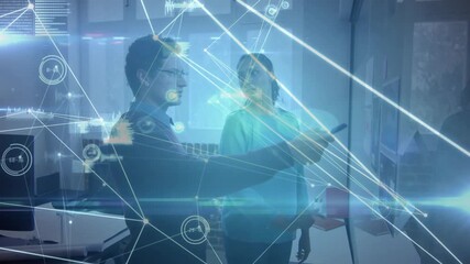 Man raising stylus and woman tapping display in meeting activating network charts for presentation - Powered by Adobe