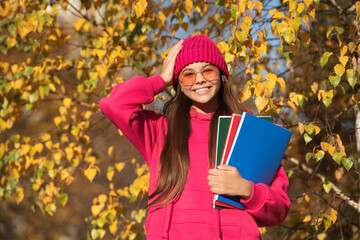 september 1. teen girl with school homework. teen girl enjoy fall outdoor. back to school. school...