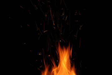 Bright flames and glowing embers rise against a dark background creating a warm and dynamic visual effect with a trail of sparks ascending into the night sky