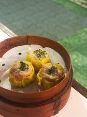 Close-up of Dim Sum in Bamboo Steamer