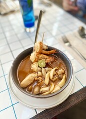 Bowl of Tom Yum Soup with Shrimp