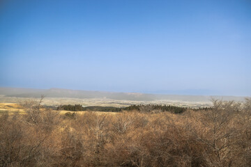 Fototapeta premium March 25 2025 Scenic Landscape with Vast Sky and Peaceful Countryside Fields, Japan