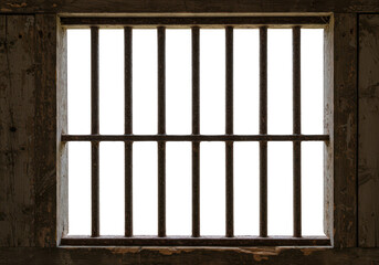 Old wooden prison window with iron bars and transparent background