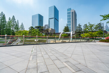 modern business office buildings with empty road,empty concrete square floor	
