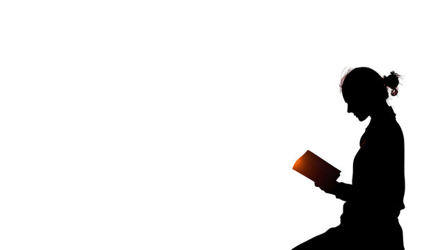 silhouette of a woman reading a book on white background - Powered by Adobe