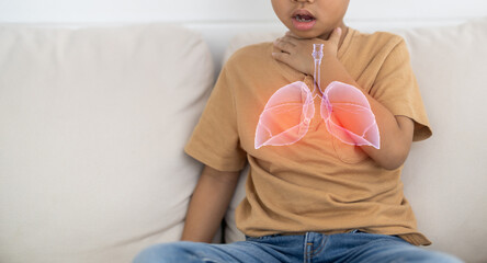 Asian boy touching throat and pain expression, sore throat symptom in children, flu or respiratory...