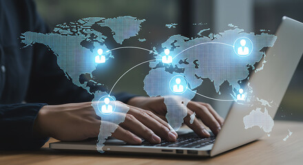 Global connectivity and digital transformation person typing on laptop with futuristic world map overlay