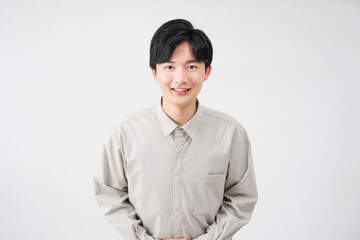 男性　お辞儀　20代　白背景　カメラ目線
