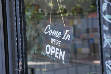 Open sign welcomes customers to local business