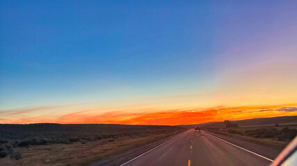 Naklejka premium sunset on the road
