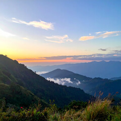 Sunrise over mountain range landscape