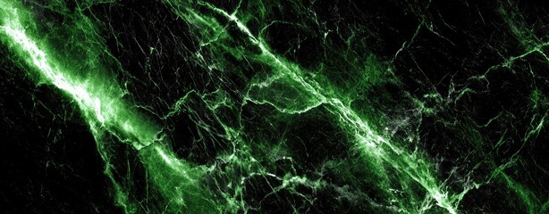 Abstract close-up of a dark green marble vein pattern on a black background