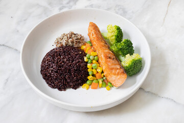 Healthy rice with vegetables and spices in a bowl