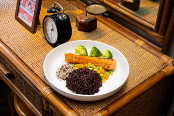 Healthy rice with vegetables and spices in a bowl