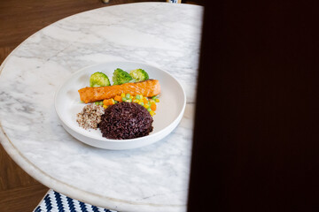 Healthy rice with vegetables and spices in a bowl
