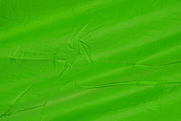 wrinkled green fabric texture background