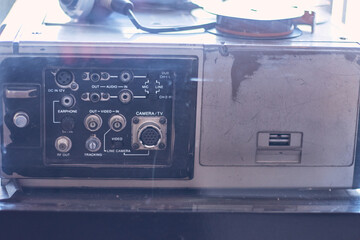 View of connectors, transmitters, old television 