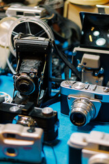 View of old cameras in good condition, very colorful and from different eras
