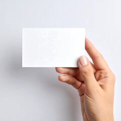 Obraz premium Blank business card held in hand