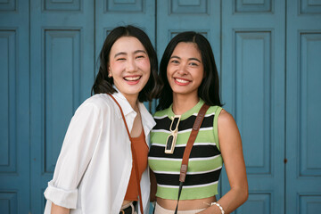 Two young women smiling outdoors