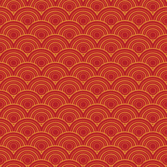 Seamless red and gold concentric semi-circle pattern background texture
