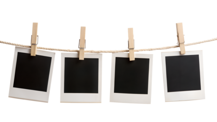 Four Instant Photo Frames Hanging on Rope Isolated on Transparent Background PNG