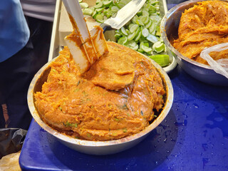 a large bowl of  the raw mix for Thai Fish Cakes, also known as 