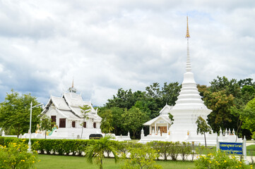 Fototapeta premium White Pagoda and White Church, Lanna Architecture, Symbols of Buddhism, South East Asia at Wat Thip Apsara Morin (Wat Noi Wang Sakae), Chiang Mai, Northern Thailand