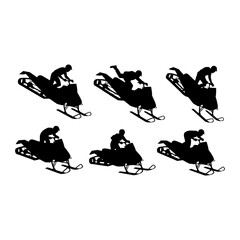 Snowmobiler performing stunts on snowmobile action