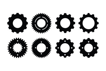 Eight Black Silhouettes of Various Gears and Cogs on White Background mechanical machinery